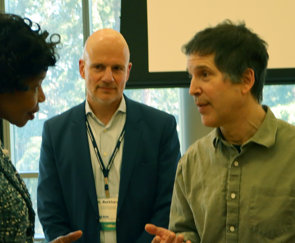 Nobel laureate Dr. David Baker with Department Chair G. Burkhard Mackensen and meeting attendee
