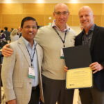 UW Anesthesiology & Pain Medicine faculty Deepak Sharma, Itay Bentov and G. Burkhard Mackensen at the AUA Meeting. Dr. Mackensen holds a certificate acknowledging our host status.